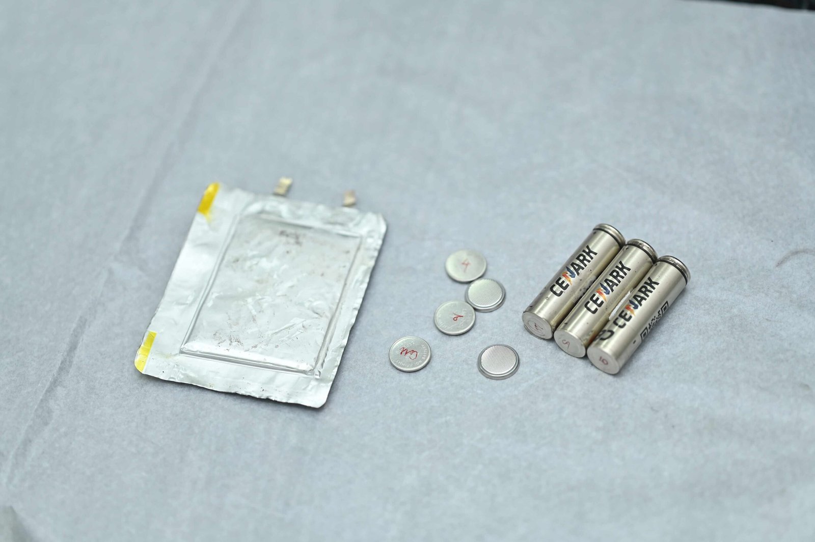 Pouch, coin and cylindrical cells made with Cellark material